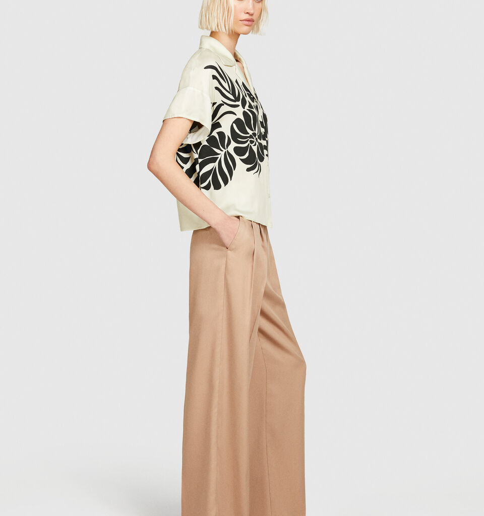 Low-waisted flare trousers - women's flared trousers - Beige | Sisley image number 2